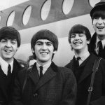 I Beatles prima di partire per un tour